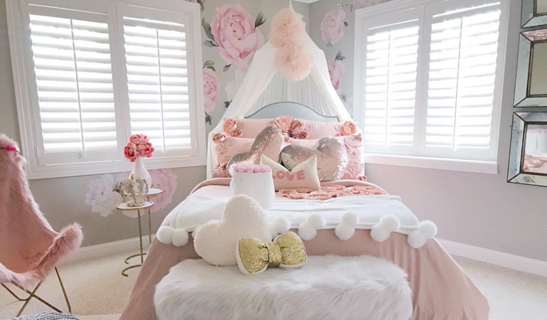 Plantation shutters can add some charm to your little one’s bedroom. Plantation shutters in a girls bedroom